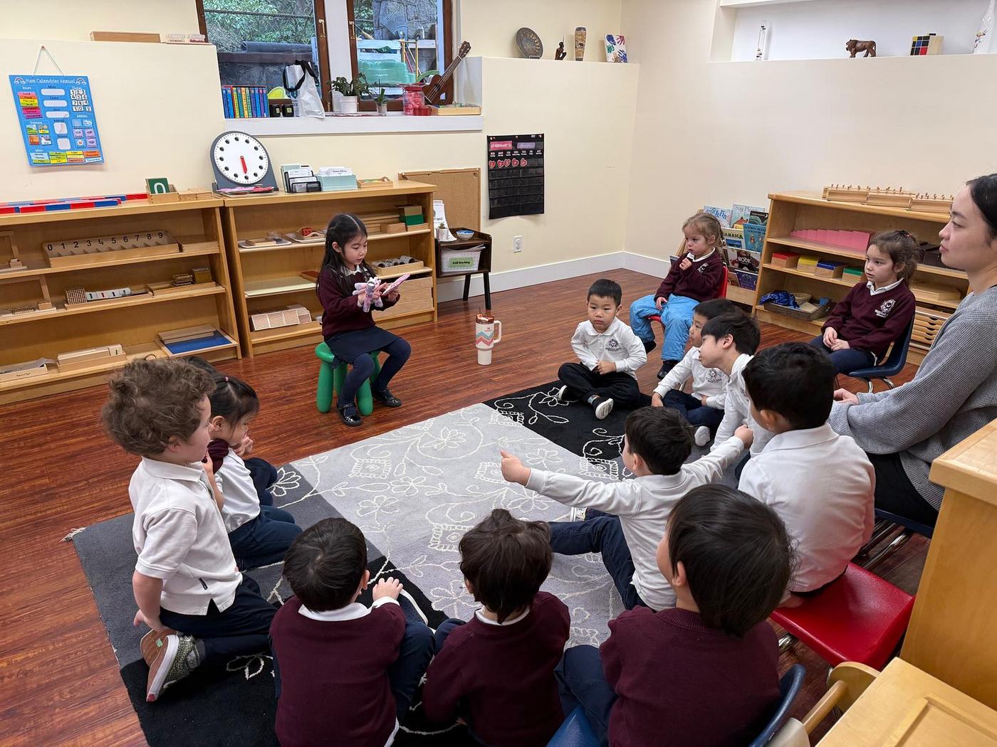 Children gathered with their teacher for circle time in a Granville House classroom